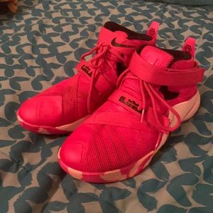 Pink Nike Lebron basketball shoes